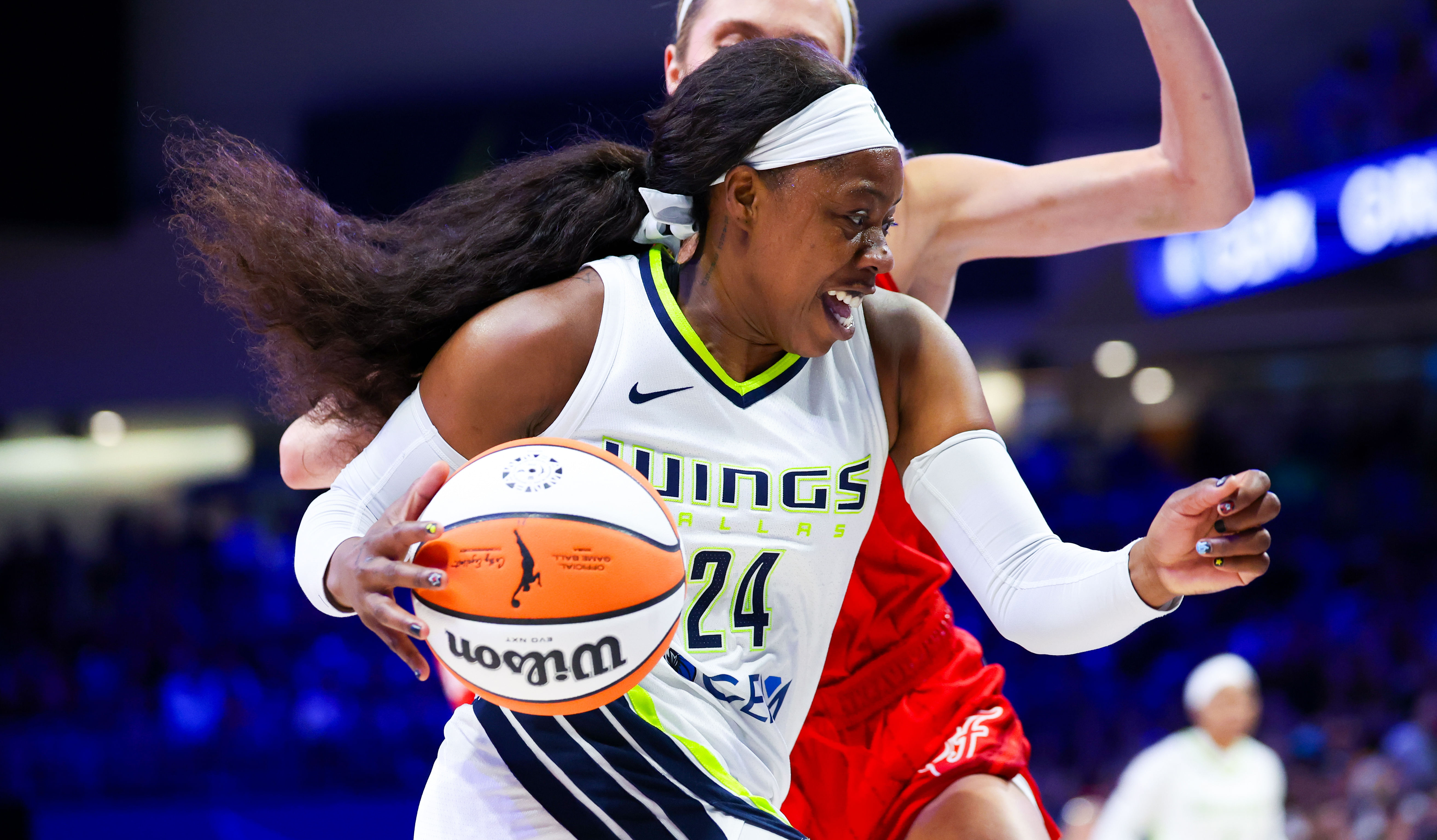 Dallas Wings guard Arike Ogunbowale drives against the Indiana Fever at College Park Center. Photo Credit: Imagn