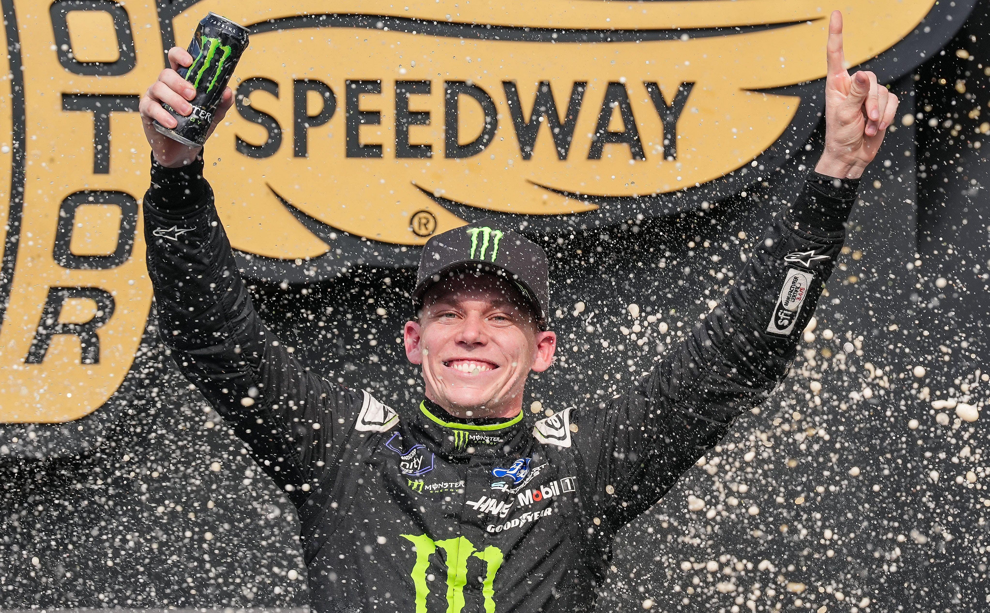 NASCAR Xfinity Series driver Riley Herbst (98) celebrates after winning the Pennzoil 250 (Source: Imagn)