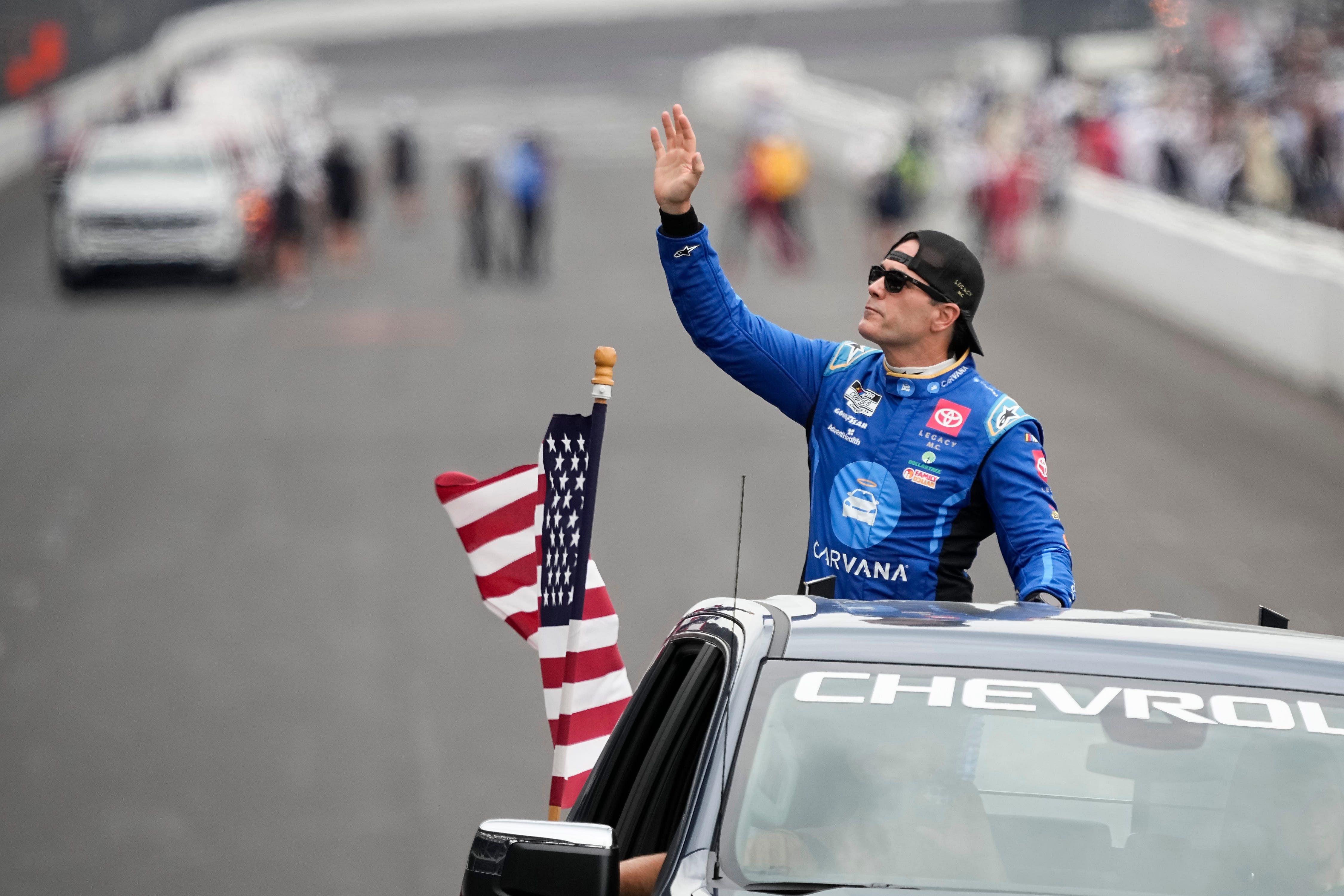 Jimmie Johnson (84) waves to fans during driver introductions prior to the Brickyard 400, Sunday, July 21, 2024, at Indianapolis Motor Speedway. Source: Imagn