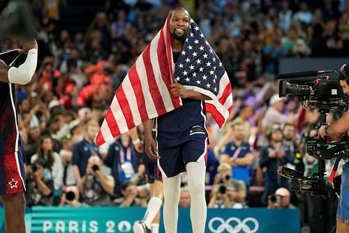 Kevin Durant celebrates after defeating France in the men's basketball gold medal game at the Paris 2024 Olympics. Photo Credit: Imagn