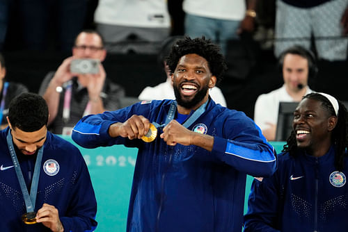 Philadelphia 76ers' Joel Embiid celebrating gold medal win in the Paris 2024 Olympics - Source: Imagn