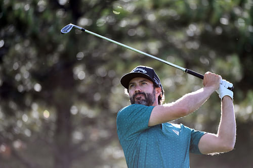 Adam Hadwin hits a tee shot on the seventh hole during the second round of the BMW Championship (Image Source: Imagn)