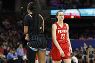 Indiana Fever guard Caitlin Clark walks by Chicago Sky forward Angel Reese during the second half at Wintrust Arena. Photo Credit: Imagn