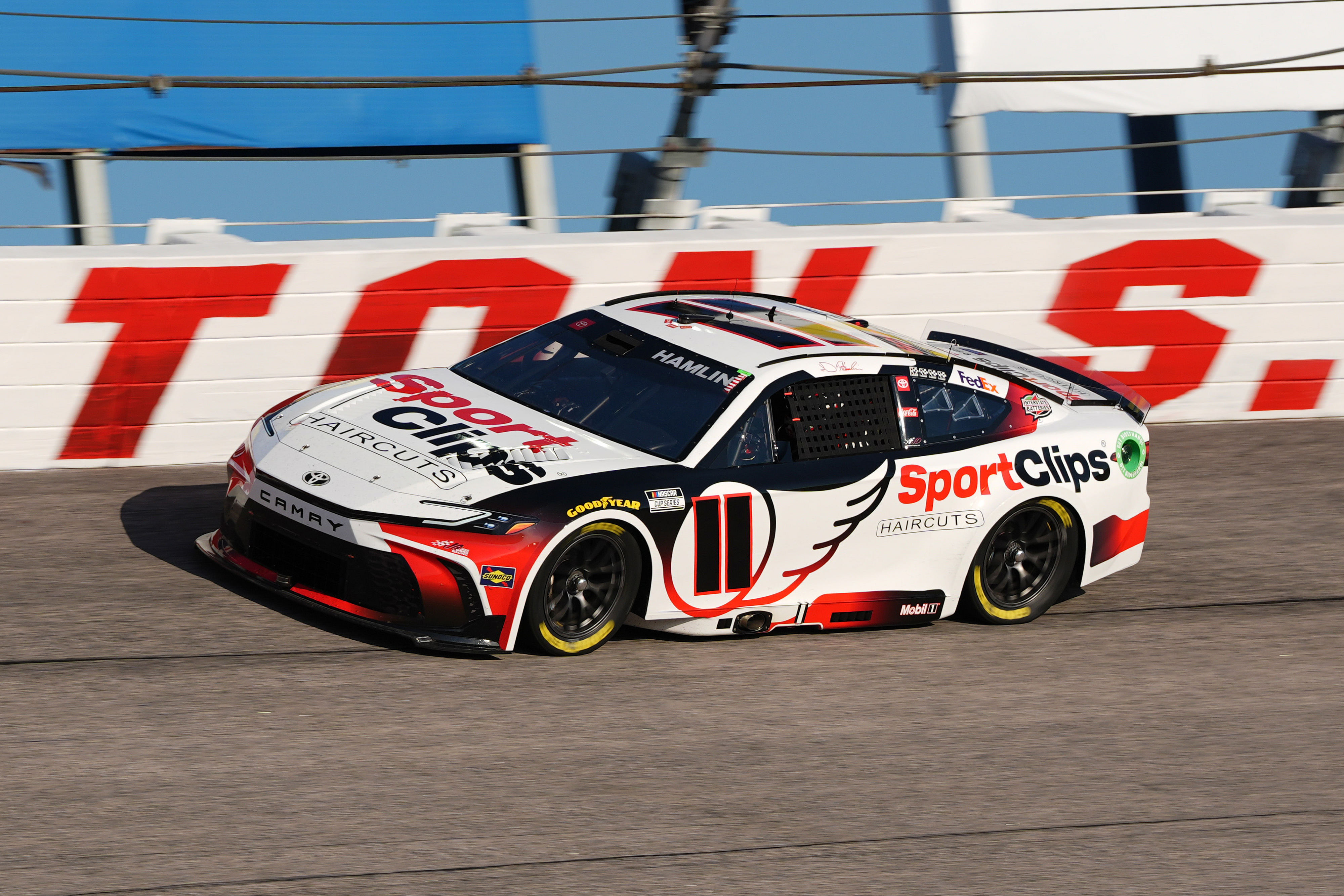 Denny Hamlin (11) races during the Cook Out Southern 500 at Darlington Raceway. (Source-Imagn).