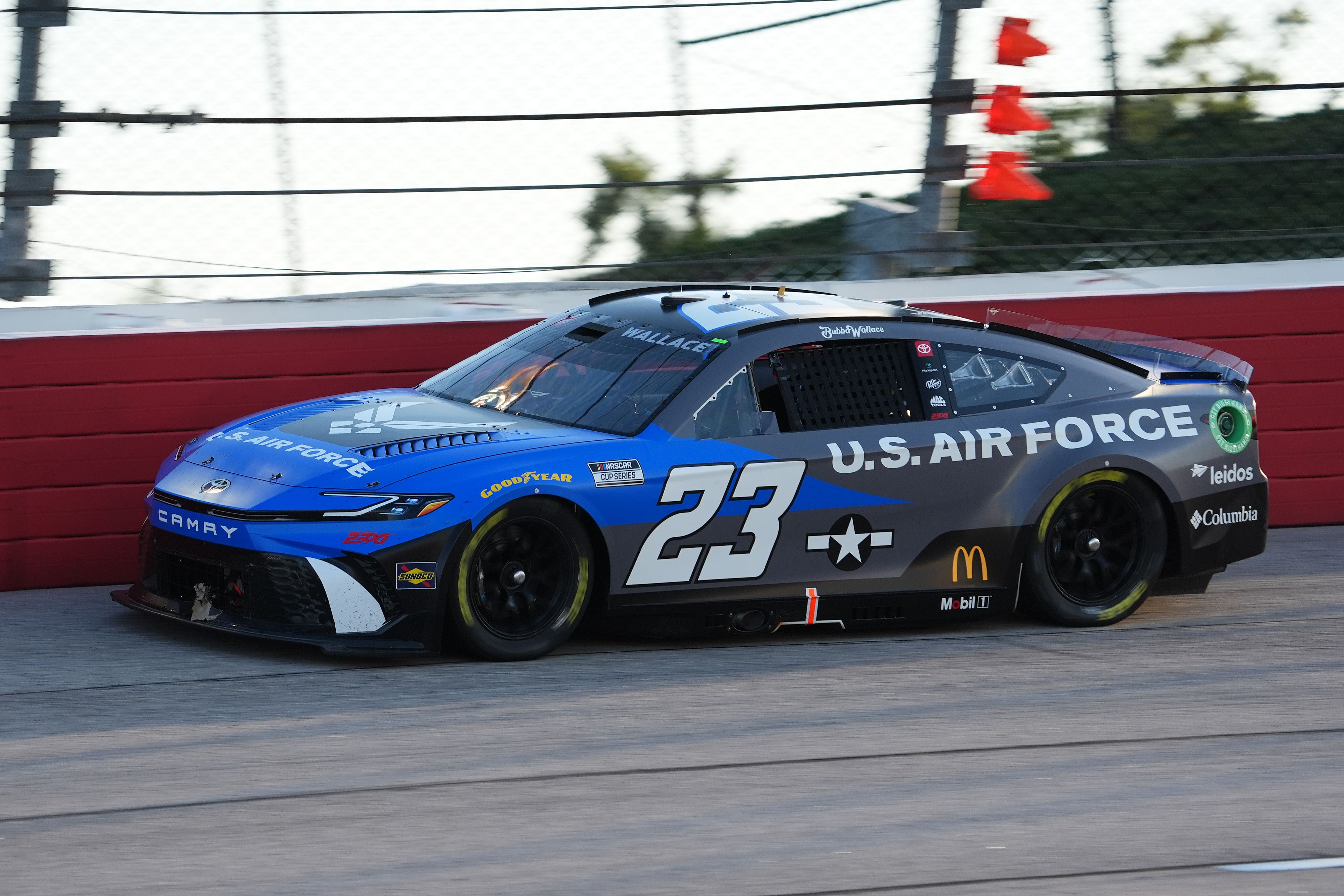 Bubba Wallace (23) races during the Cook Out Southern 500 at Darlington Raceway. Mandatory Credit: Jasen Vinlove-Imagn