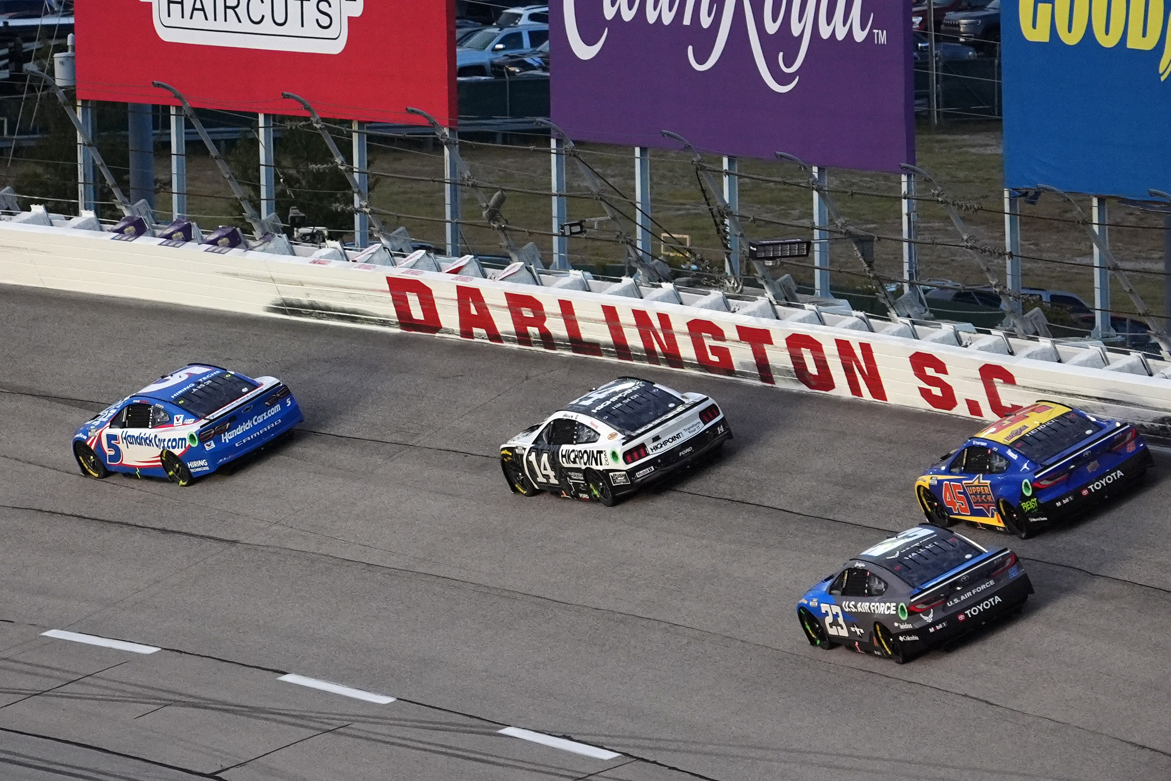 Kyle Larson (5) leads NASCAR Cup Series driver Chase Briscoe (14), NASCAR Cup Series driver Bubba Wallace (23) and NASCAR Cup Series driver Tyler Reddick (45). (Source: IMAGN)