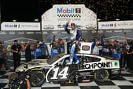 Chase Briscoe (14) celebrates after winning the Cook Out Southern 500 at Darlington Raceway. Mandatory Credit: Jasen Vinlove-Imagn Images
