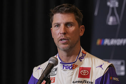 Denny Hamlin speaks to media members during the NASCAR Playoffs Media Day (Image via Imagn)