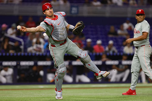 J.T. Realmuto underwent surgery on his right knee this year (Image Credit: IMAGN)