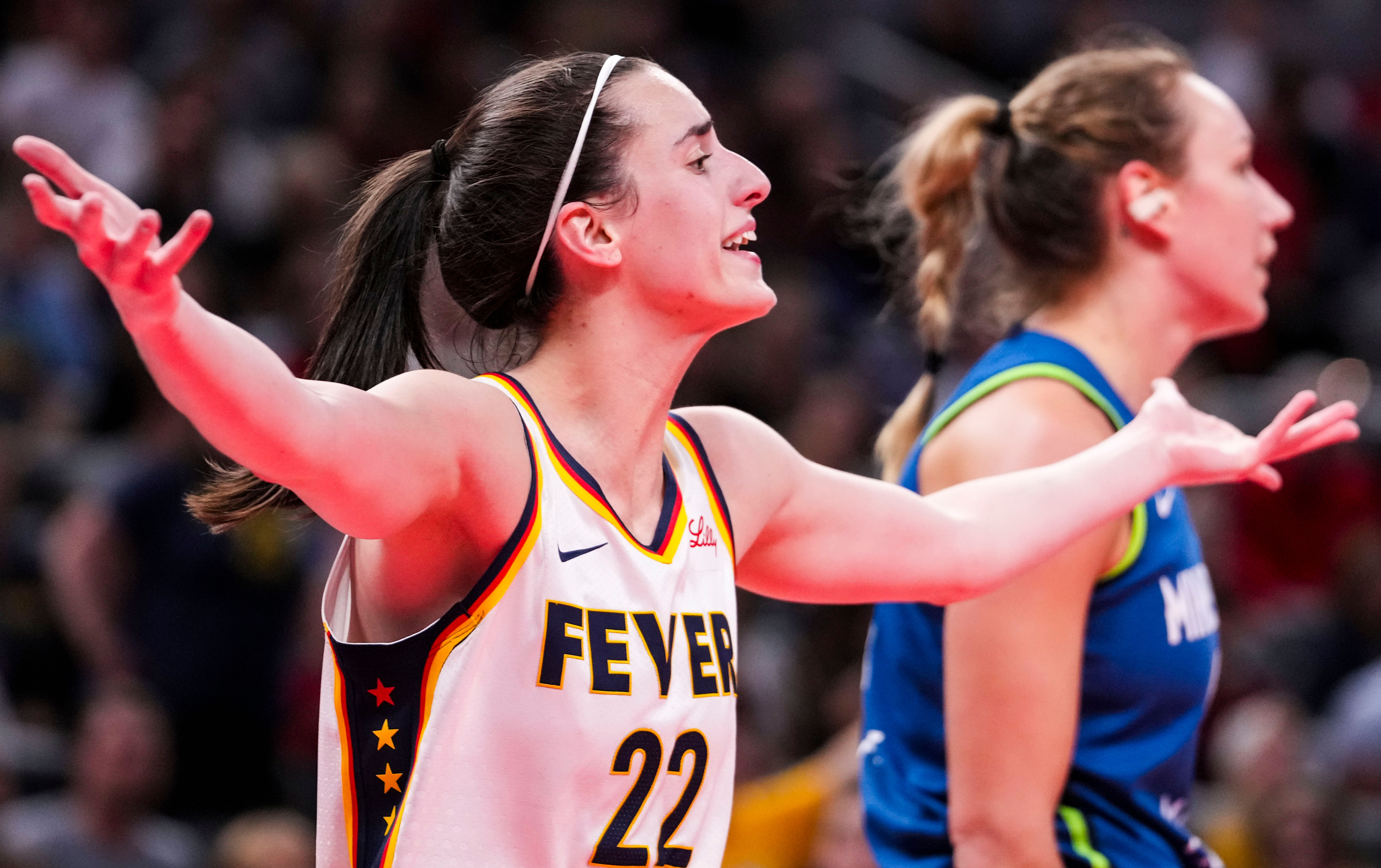 Indiana Fever guard Caitlin Clark reacts to a call during a game at Gainbride Fieldhouse. Photo Credit: Imagn