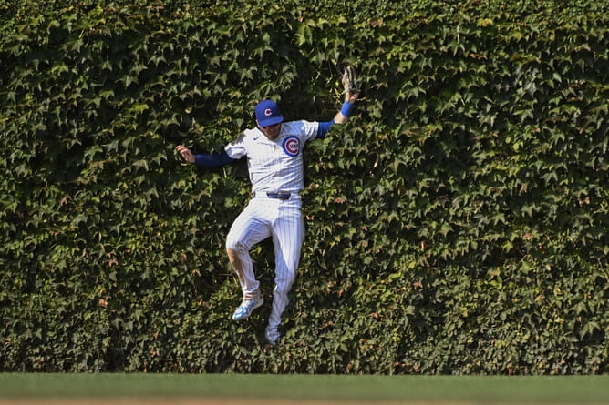 Did 'The Simpsons' predict Ian Happ’s catch in the ivy? Exploring the connection between Cubs CF's hilarious bush dive and the viral cartoon GIF
