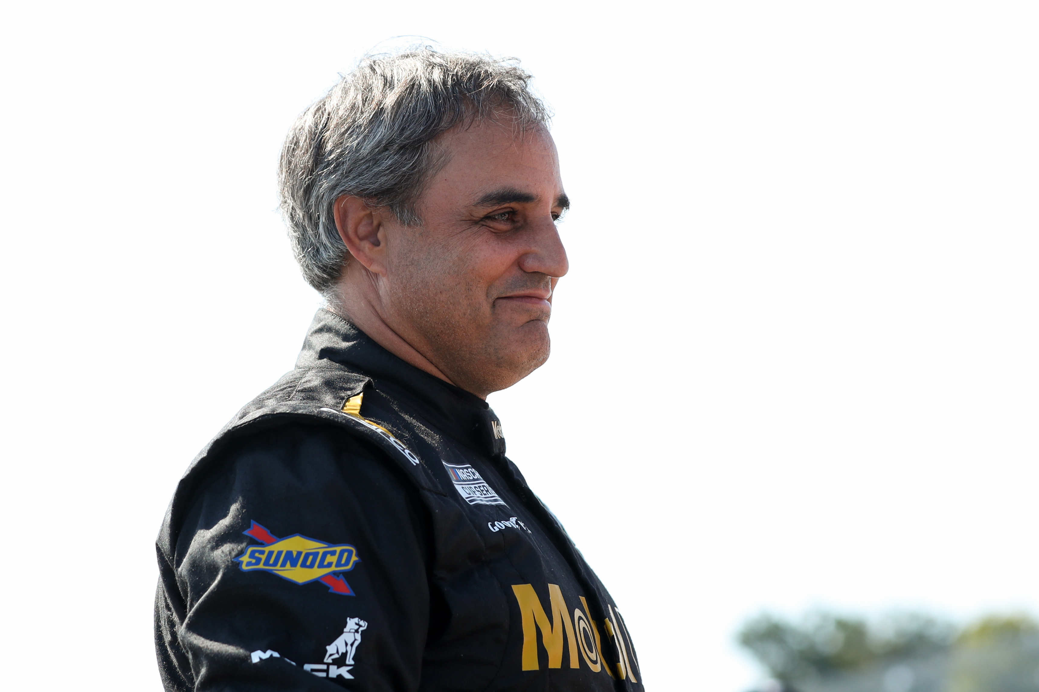 Juan Pablo Montoya stands on pit road during practice and qualifying for the Go Bowling at The Glen at Watkins Glen International (Source: Imagn)