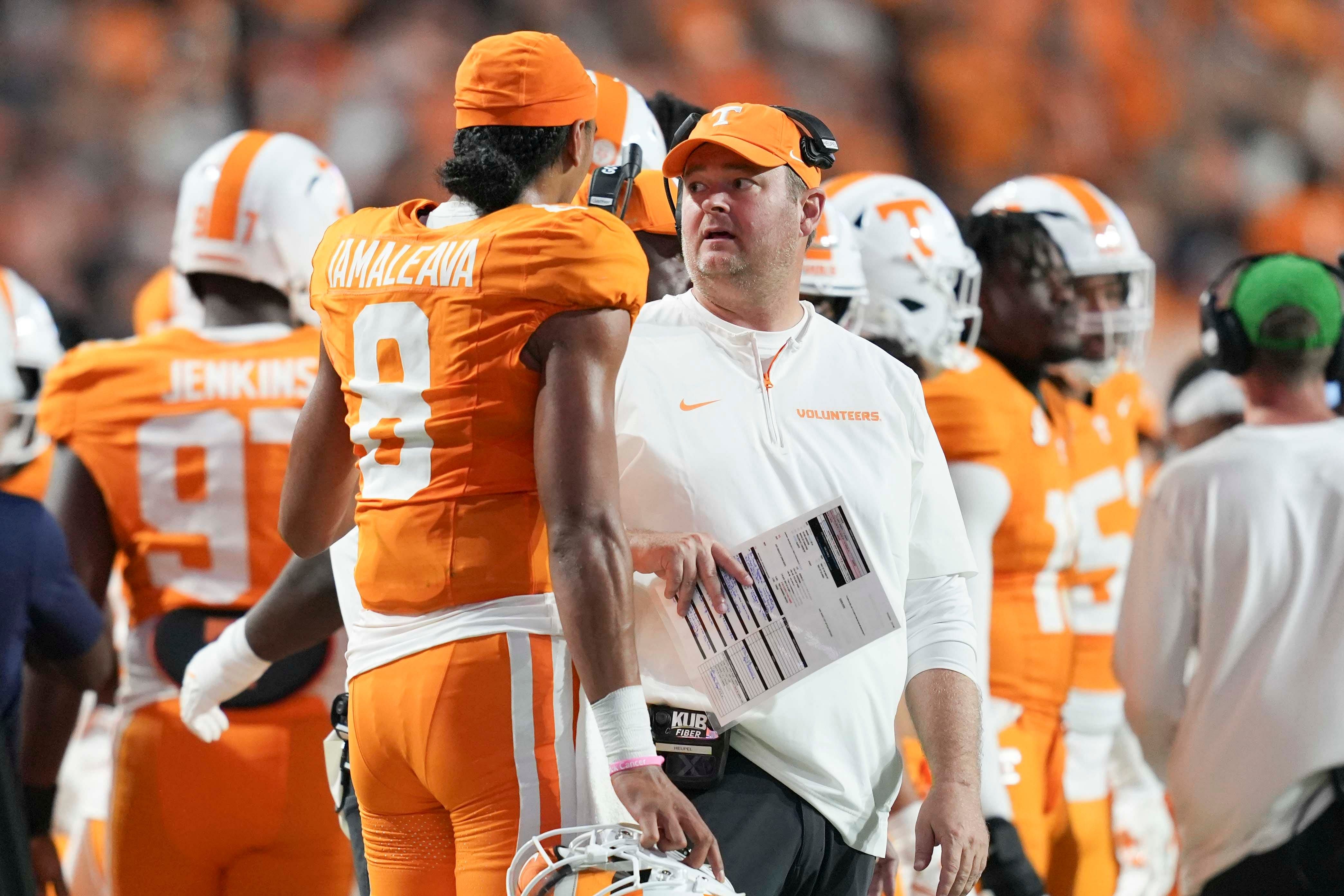 Volunteers coach Josh Heupel and  quarterback Nico Iamaleava (Credits: IMAGN)