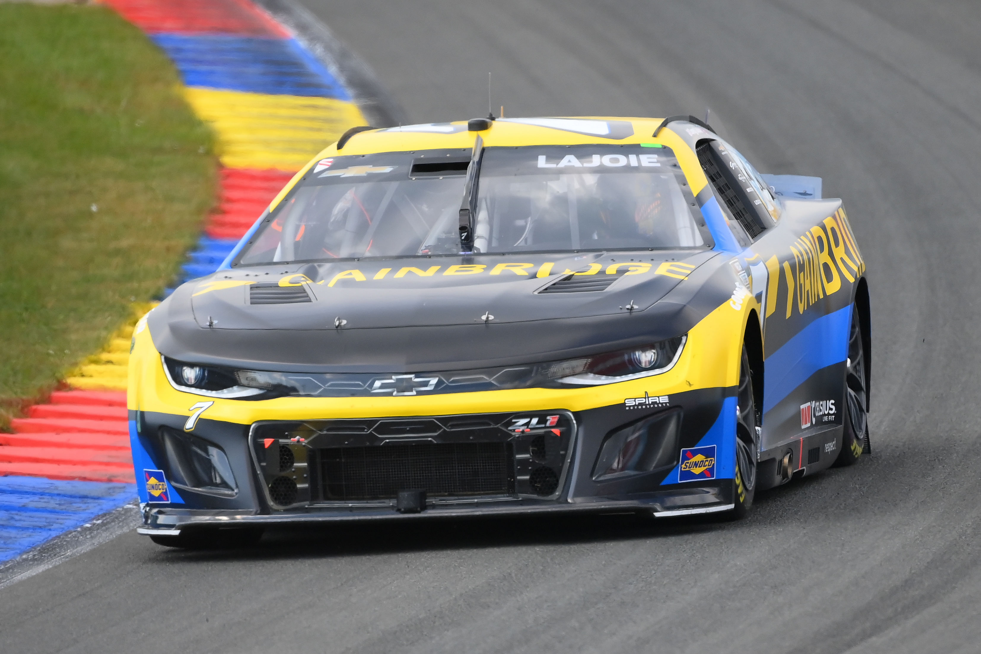 Corey LaJoie (7) drives during the Go Bowling at The Glen at Watkins Glen International. (Image Source: Imagn)