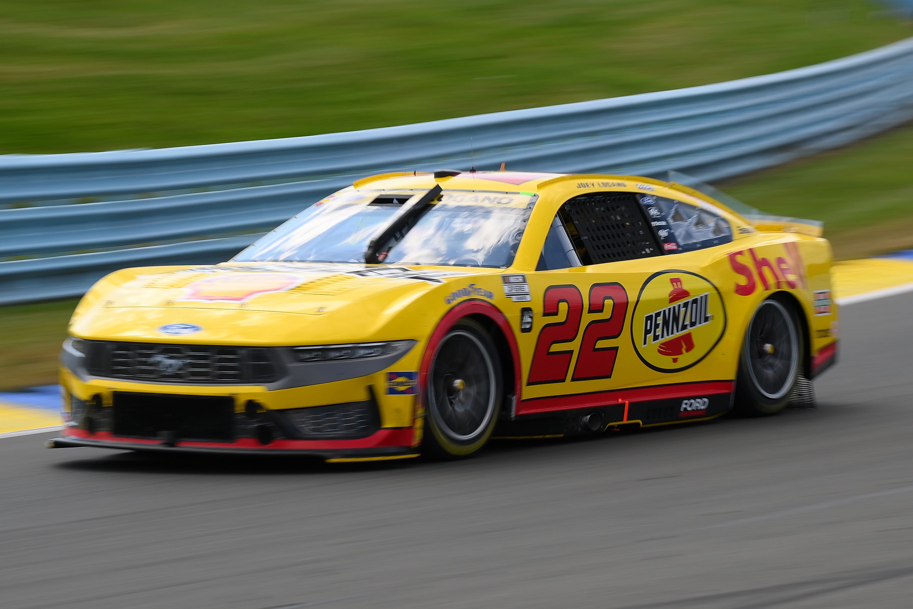 Joey Logano (22) drives during the Go Bowling at The Glen at Watkins Glen International. Mandatory Credit: Rich Barnes-Imagn Images