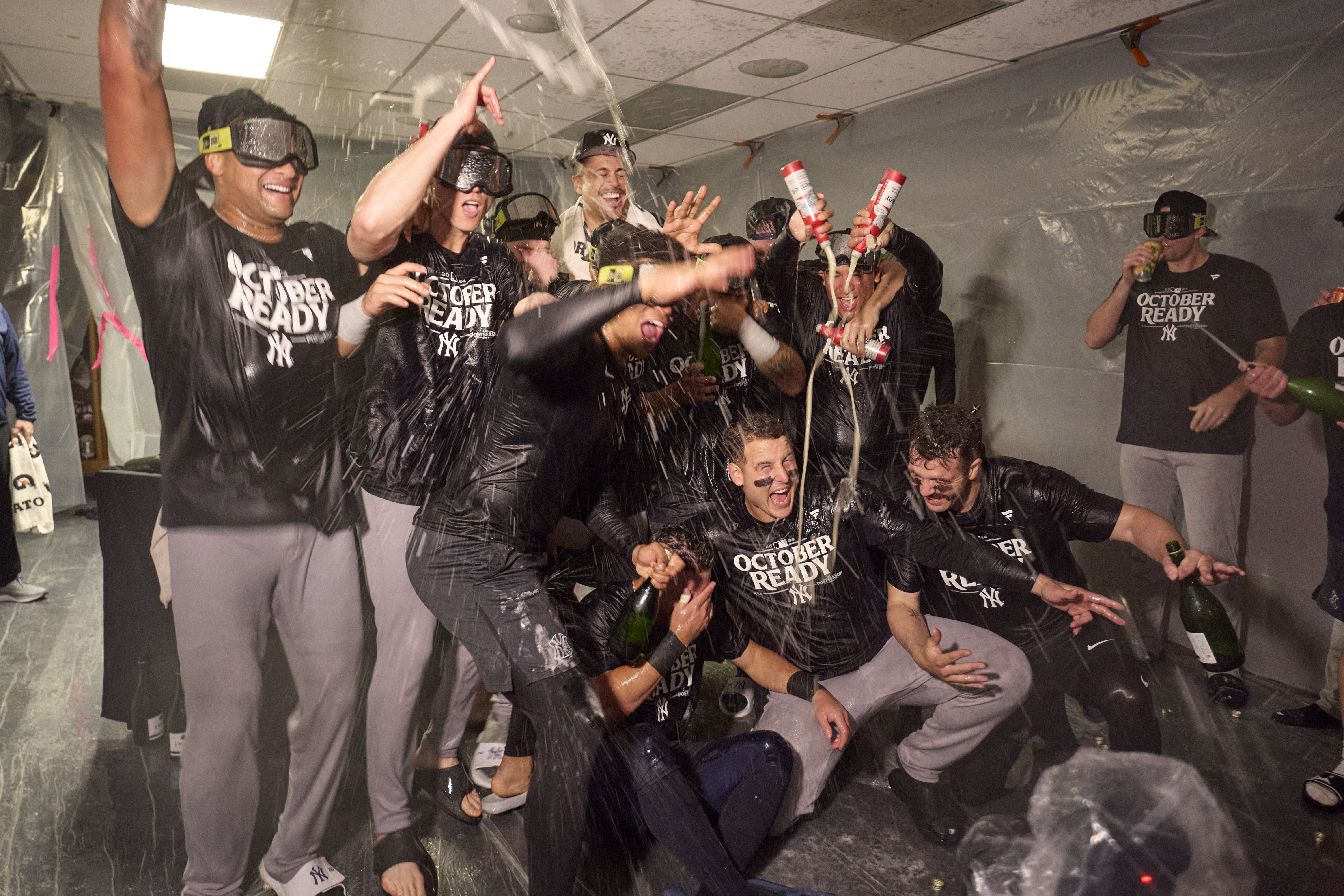 The Yankees clinched a spot in the playoffs (Imagn)