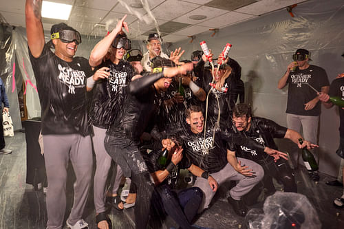 The Yankees clinched a spot in the playoffs (Imagn)