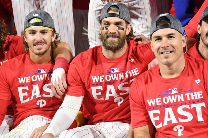 WATCH: Bryce Harper goes topless in epic champagne shower celebration as Phillies capture NL East for the first time since 2011
