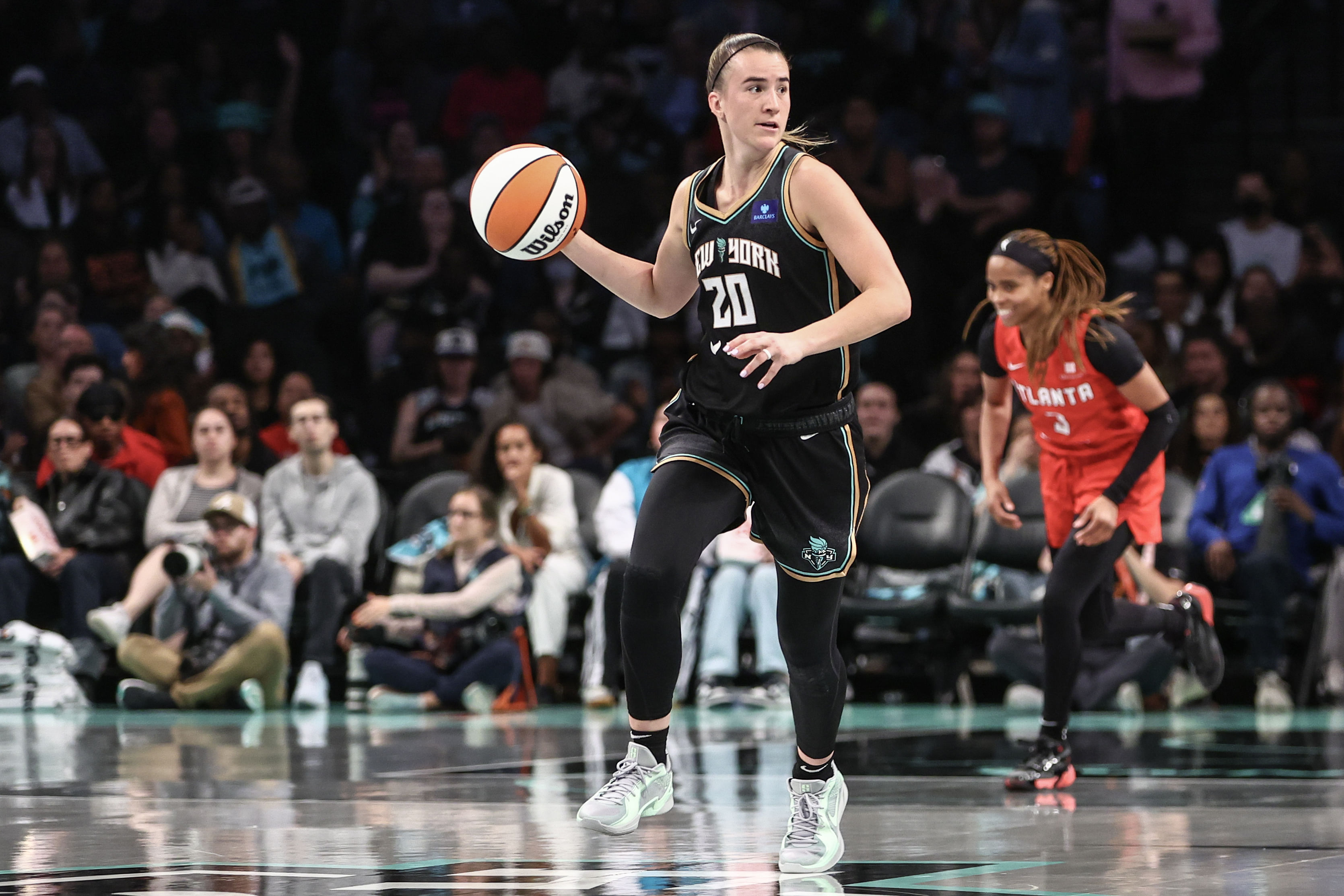 New York Liberty guard Sabrina Ionescu brings the ball up the court in the 2024 WNBA Playoffs at Barclays Center. Photo Credit: Imagn