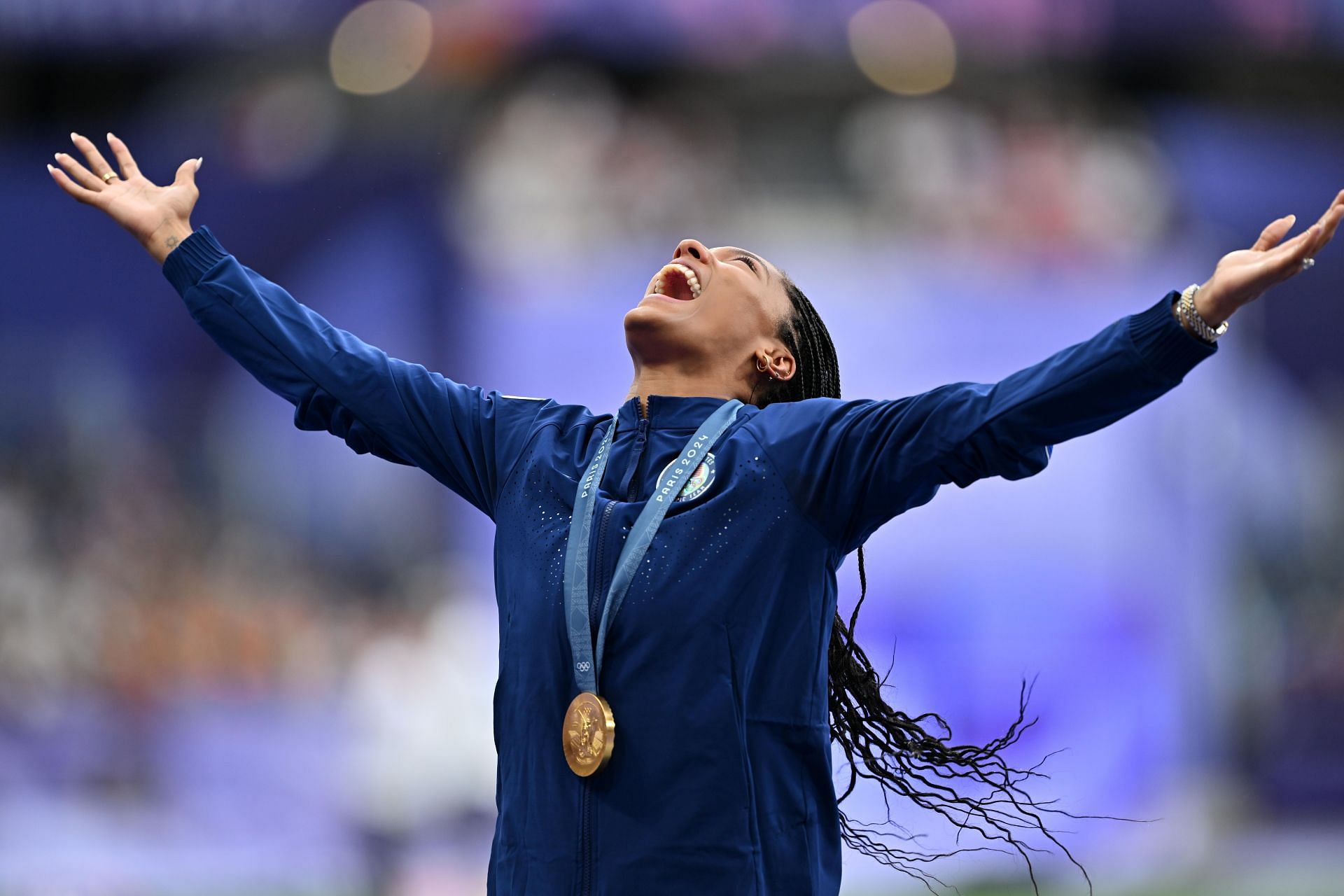 Davis-Woodhall during the long jump medal ceremony at Paris Olympics (Source: Getty)