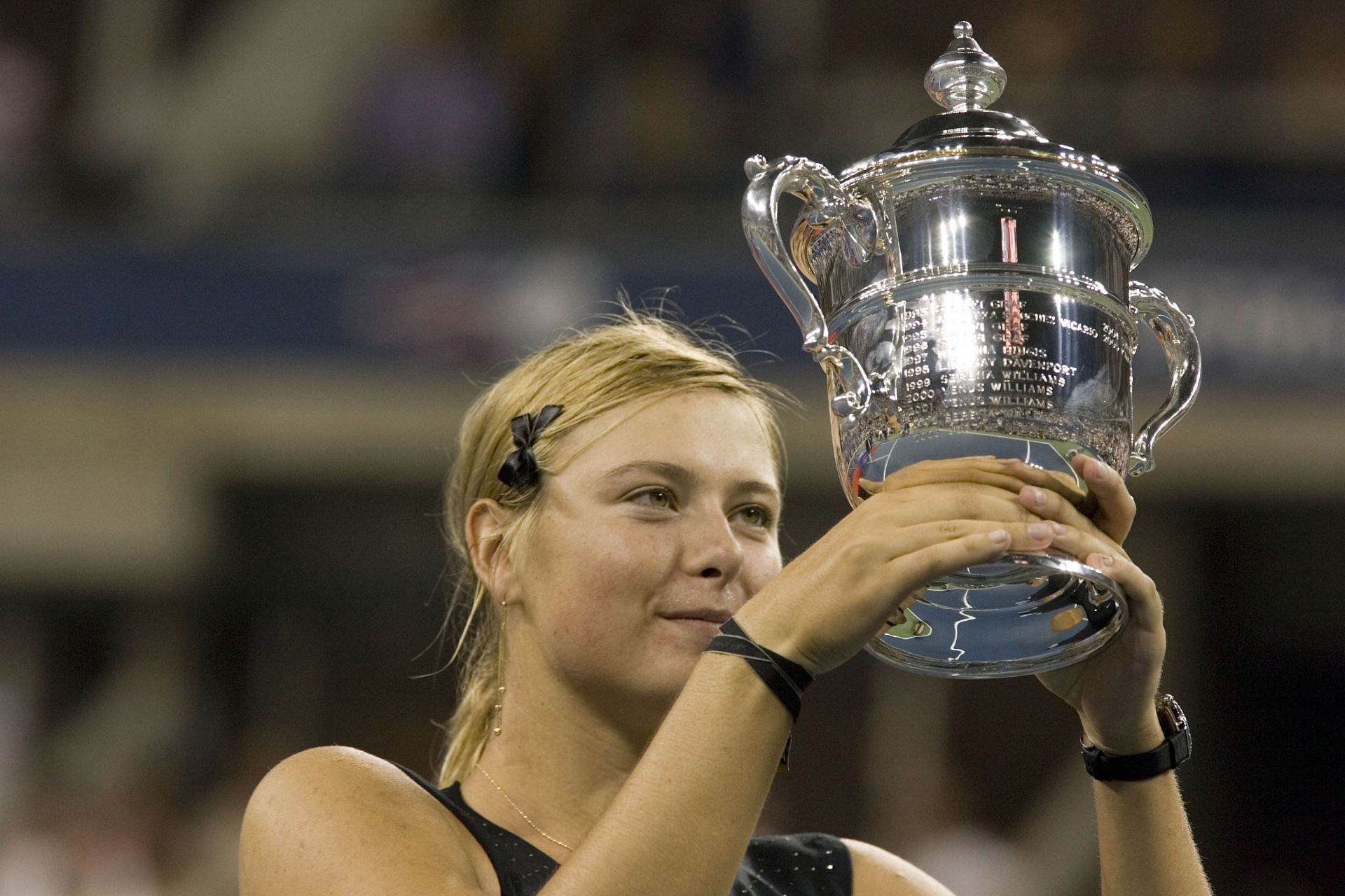 Maria Sharapova with the 2006 US Open trophy. (Image: Getty)