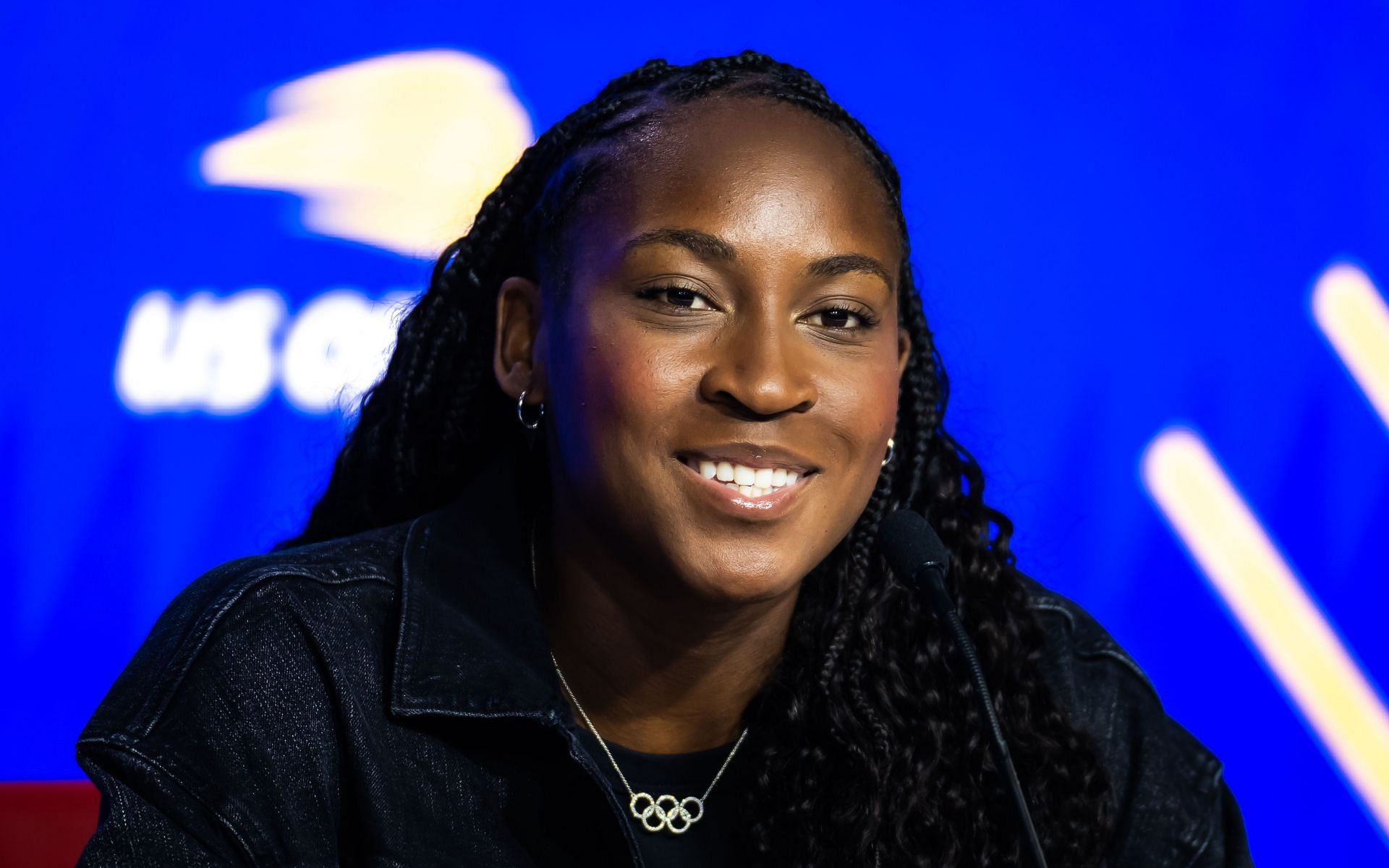 Coco Gauff interacts with the media at the 2024 US Open