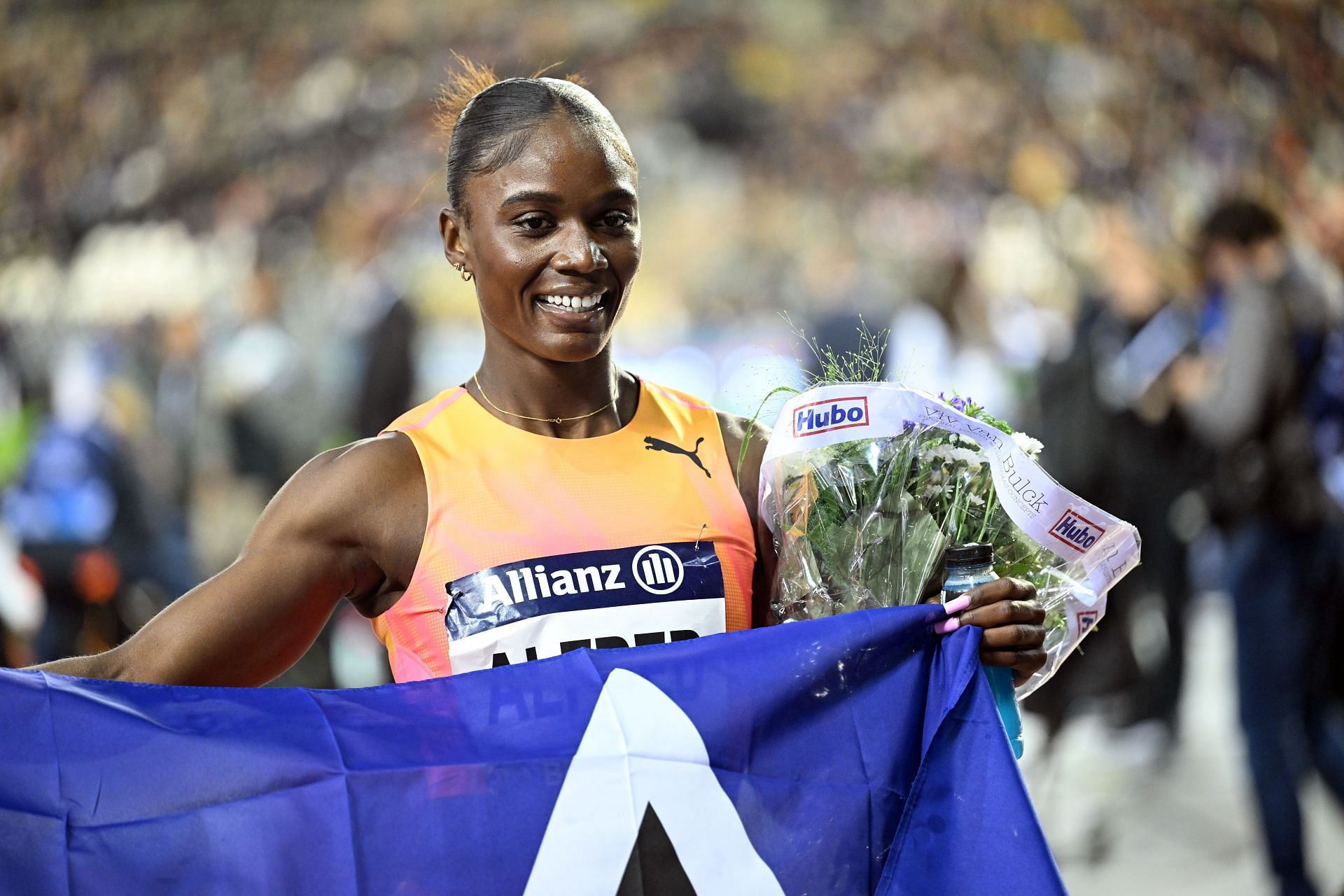 Julien Alfred celebrates winning the 100m event at the Diamond League in Brussels, Belgium. (Photo by via Getty Images)