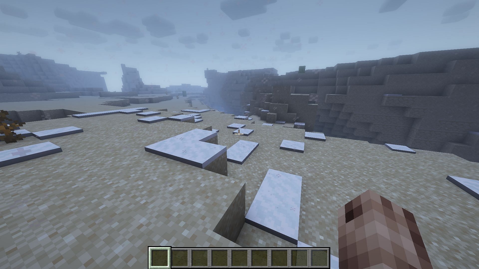 A desert converting into a snowy taiga using the /fillbiome command in Minecraft (Image via Mojang)