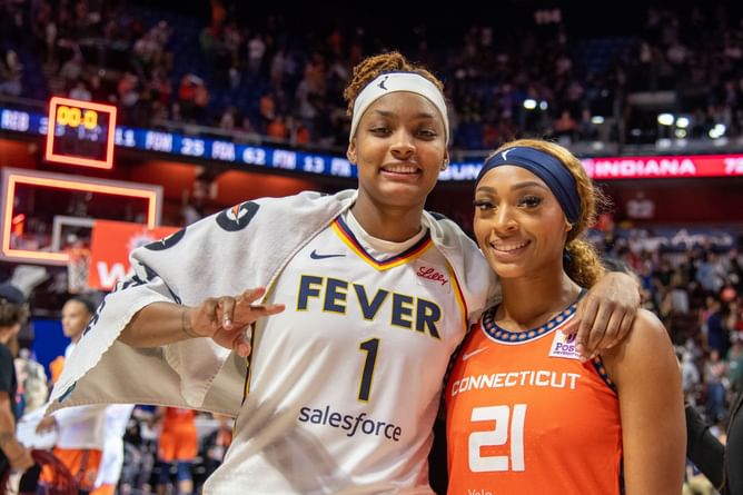 "Messiest league ever" - WNBA fans react to DiJonai Carrington & NaLyssa Smith's post-game couple moment