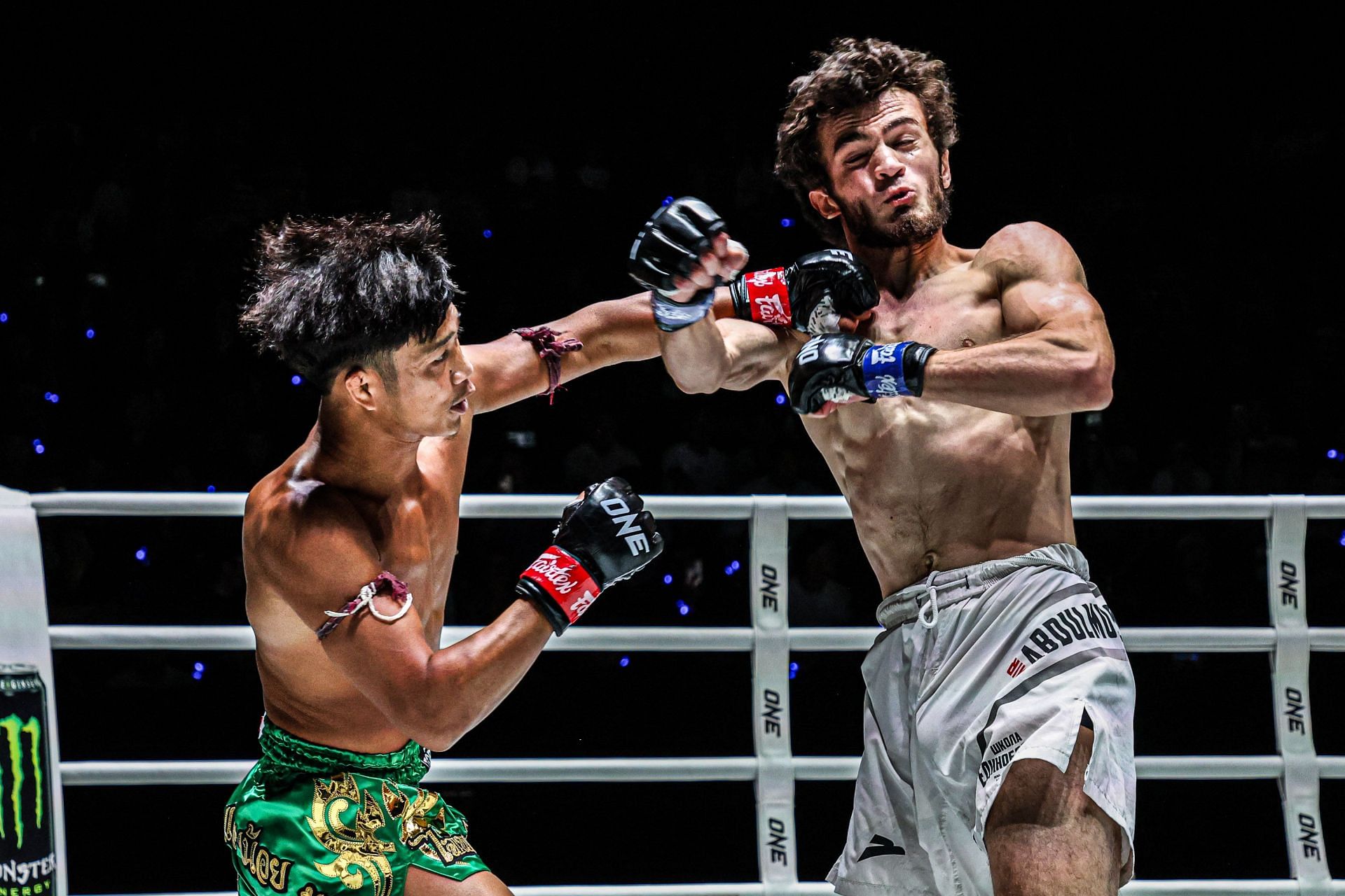 (From left) Kongchai Chanaidonmueang and Amir Abdulmuslimov.