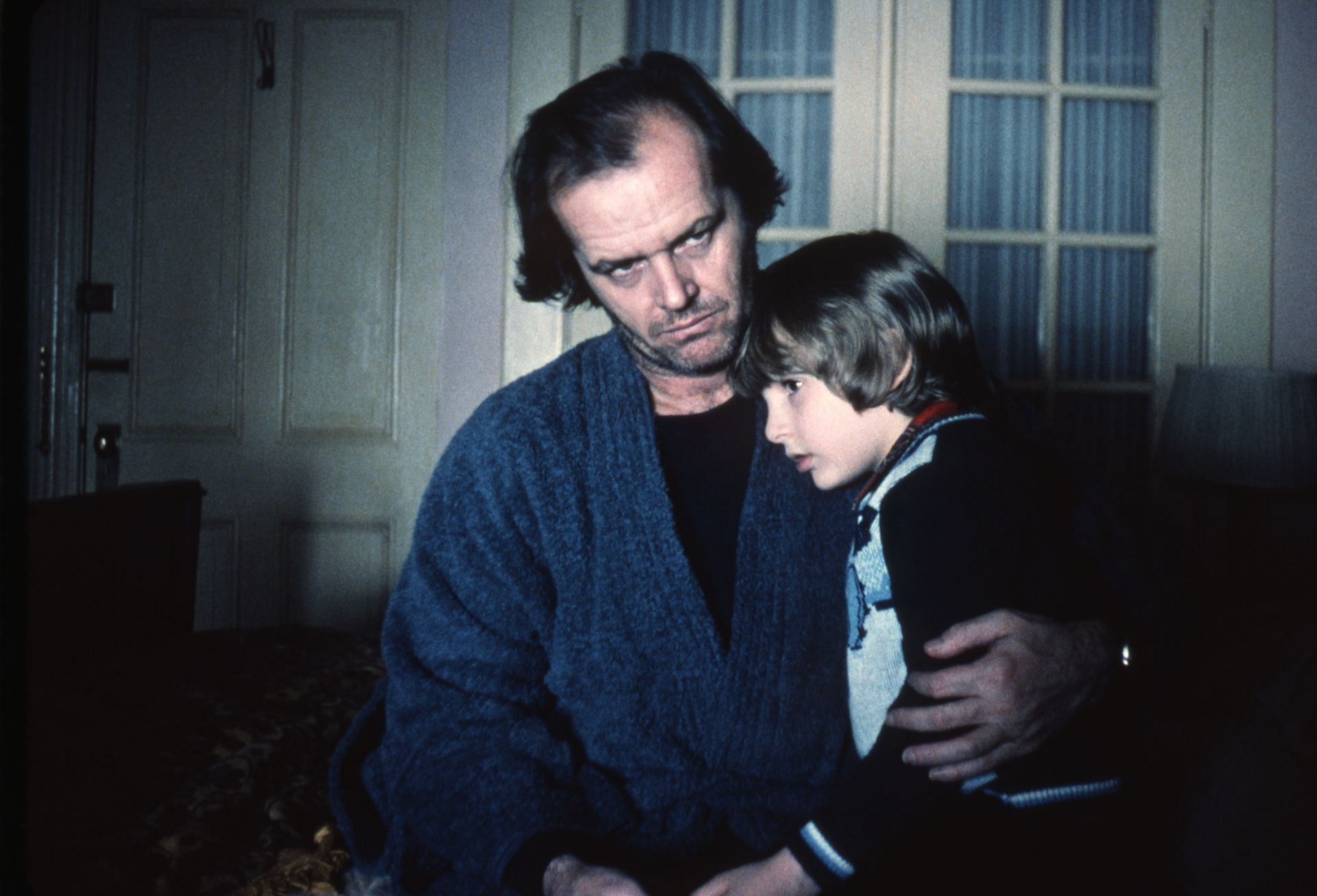 Jack Nicholson and Danny Lloyd on the set of The Shining, directed by Stanley Kubrick. (Image via Getty/Sunset Boulevard/Corbis)