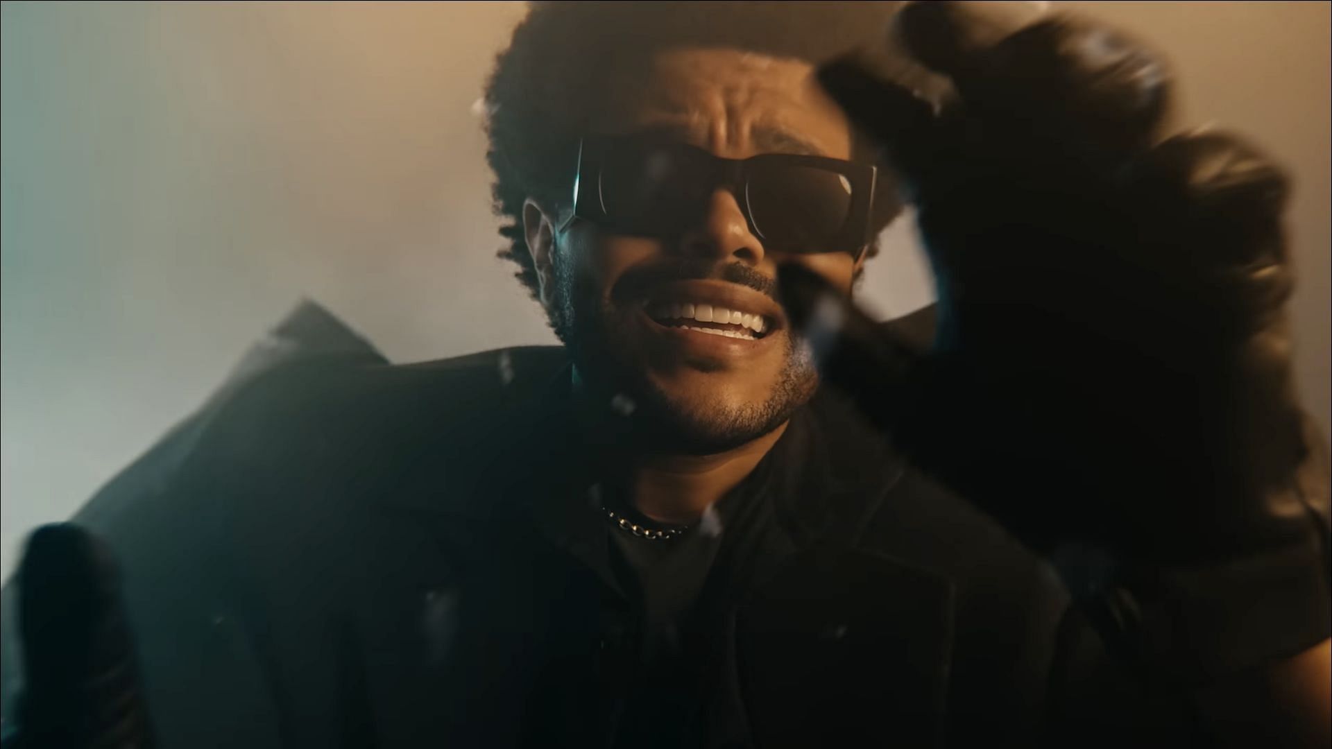 A screenshot of The Weeknd in his music video for 