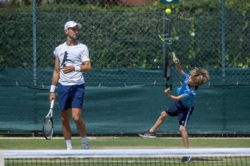 Novak Djokovic with his son Stefan [Source: Getty]