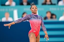 Simone Biles flaunts her pilot-themed attire as the 'Gold Over America Tour' sets off in Oceanside