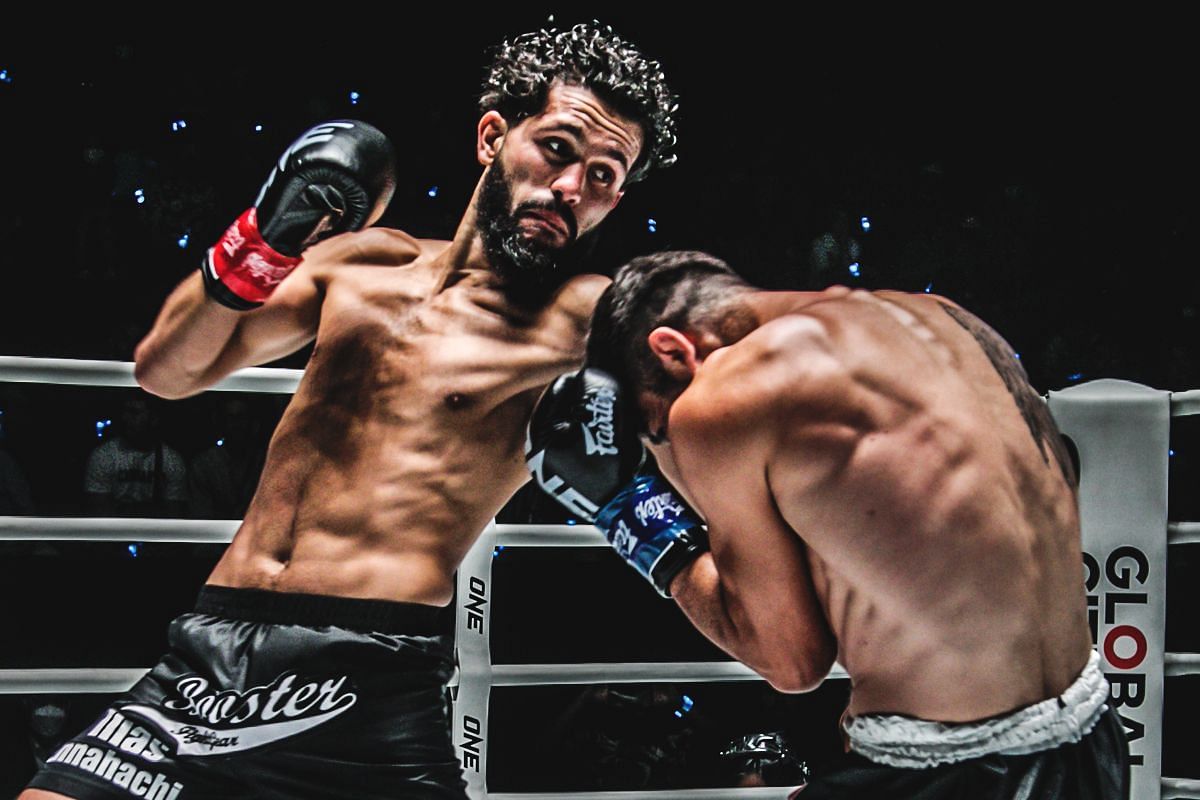 Ilias Ennahachi fighting Aliasghar Ghodratisaraskan. [Photo via: ONE Championship]