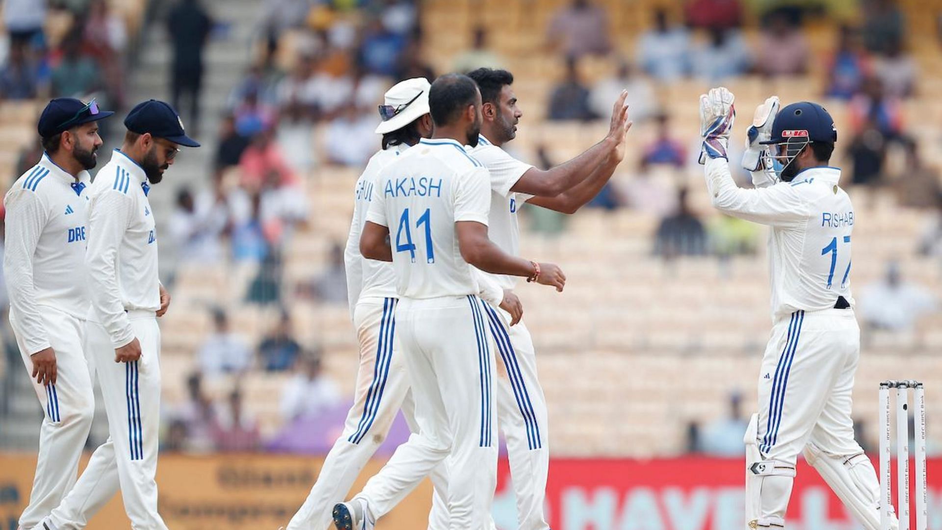 Ashwin celebrating with his teammates after a wicket in final innings. (Image: BCCI/X)