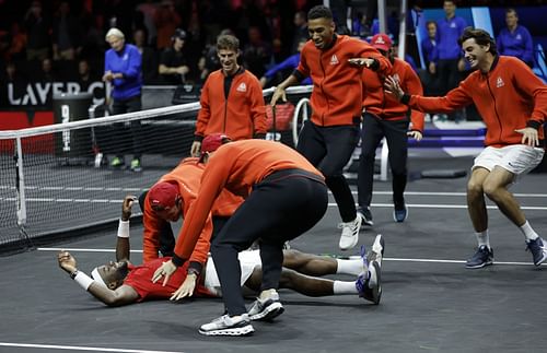 Tiafoe (supine) at the Laver Cup 2022 Day 3 | Getty Images