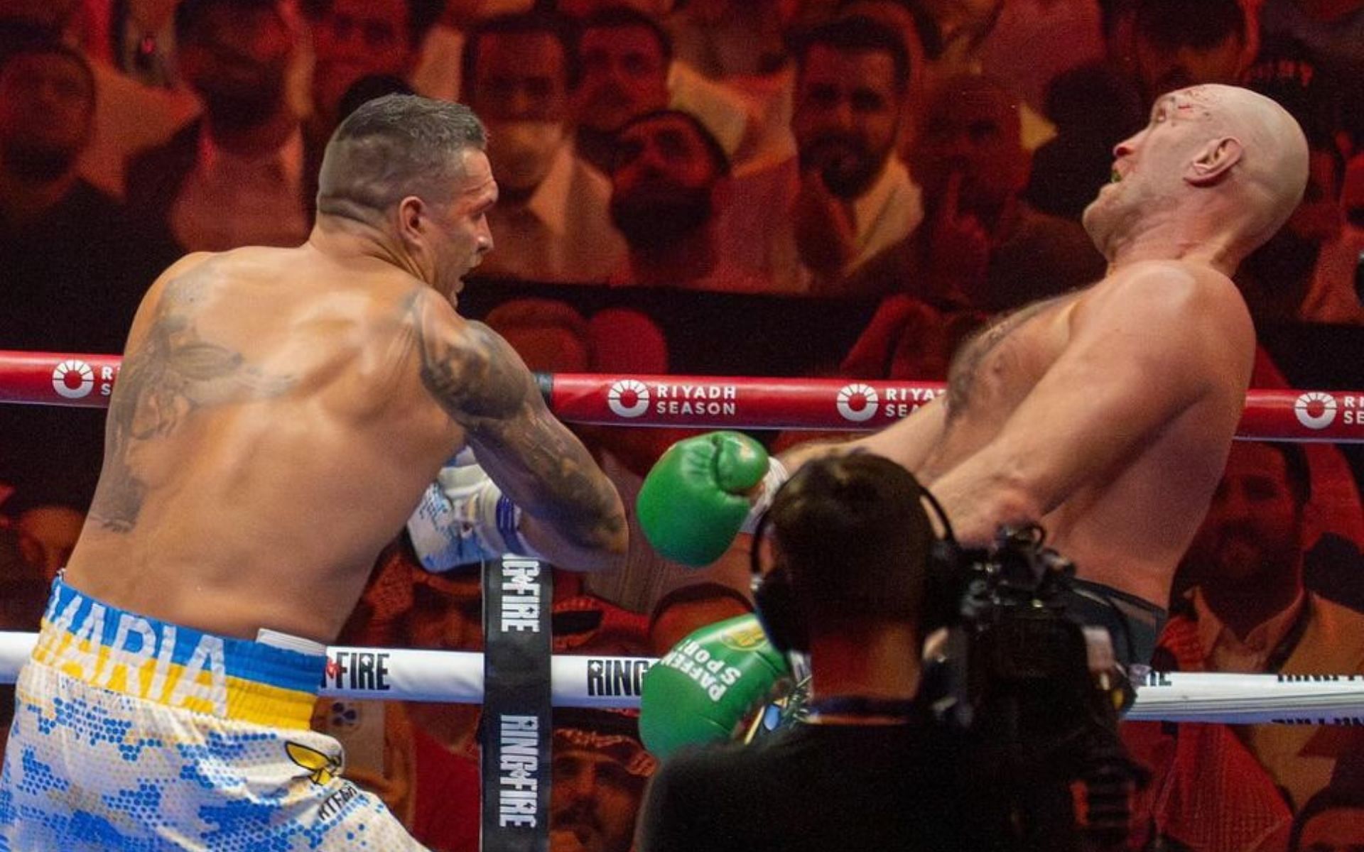 Oleksandr Usyk (left) had Tyson Fury (right) in big trouble in the second half of their boxing match [Image courtesy: @usykaa on Instagram]