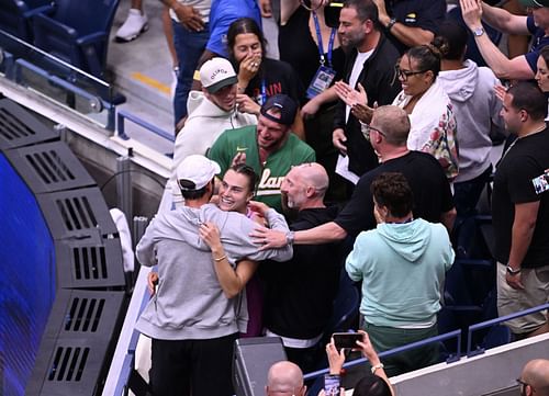 Aryna Sabalenka meets her team after winning the US Open 2024 final. (Image via Getty)