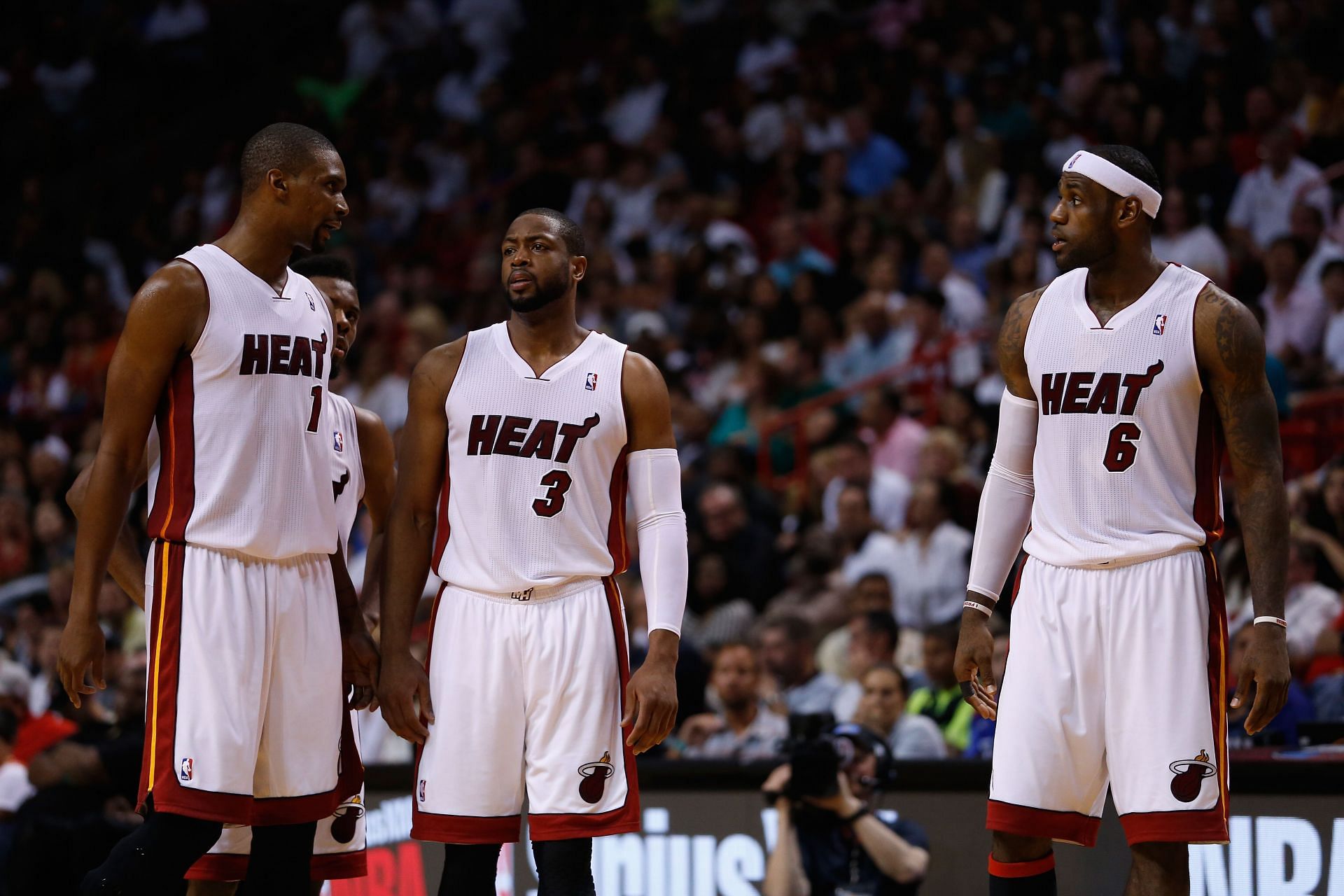 Wade (center) with Chris Bosh and LeBron James (Image via Getty)