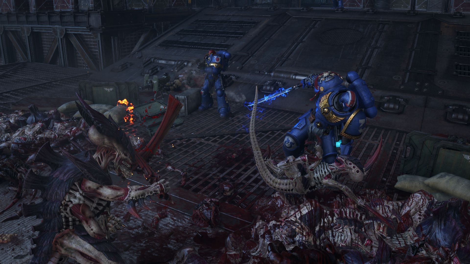 Eliminating Tyranid monsters in Warhammer 40k: Space Marine 2 (Image via Focus Entertainment)