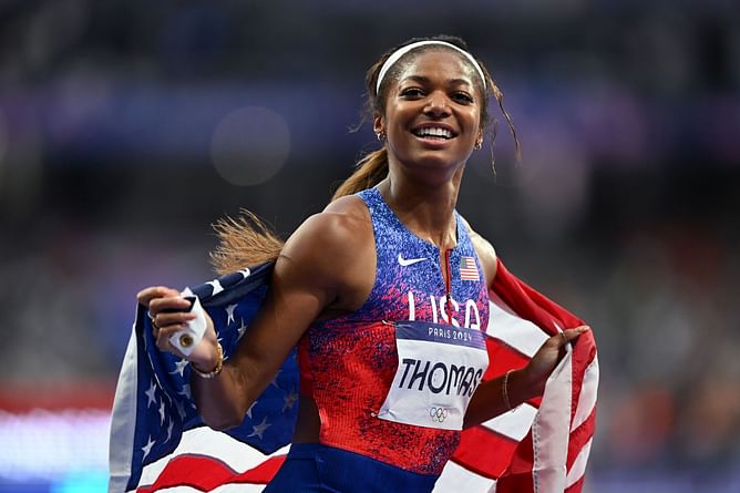 In Pictures: After winning 3 gold medals at Paris Olympics, Gabby Thomas returns to Harvard University to reunite with former Track and Field Team