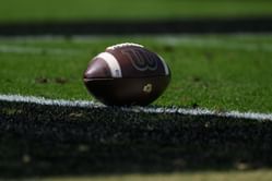 Former NCAA national champion and North Carolina high school football head coach suspended over incident involving a felony strangulation charge