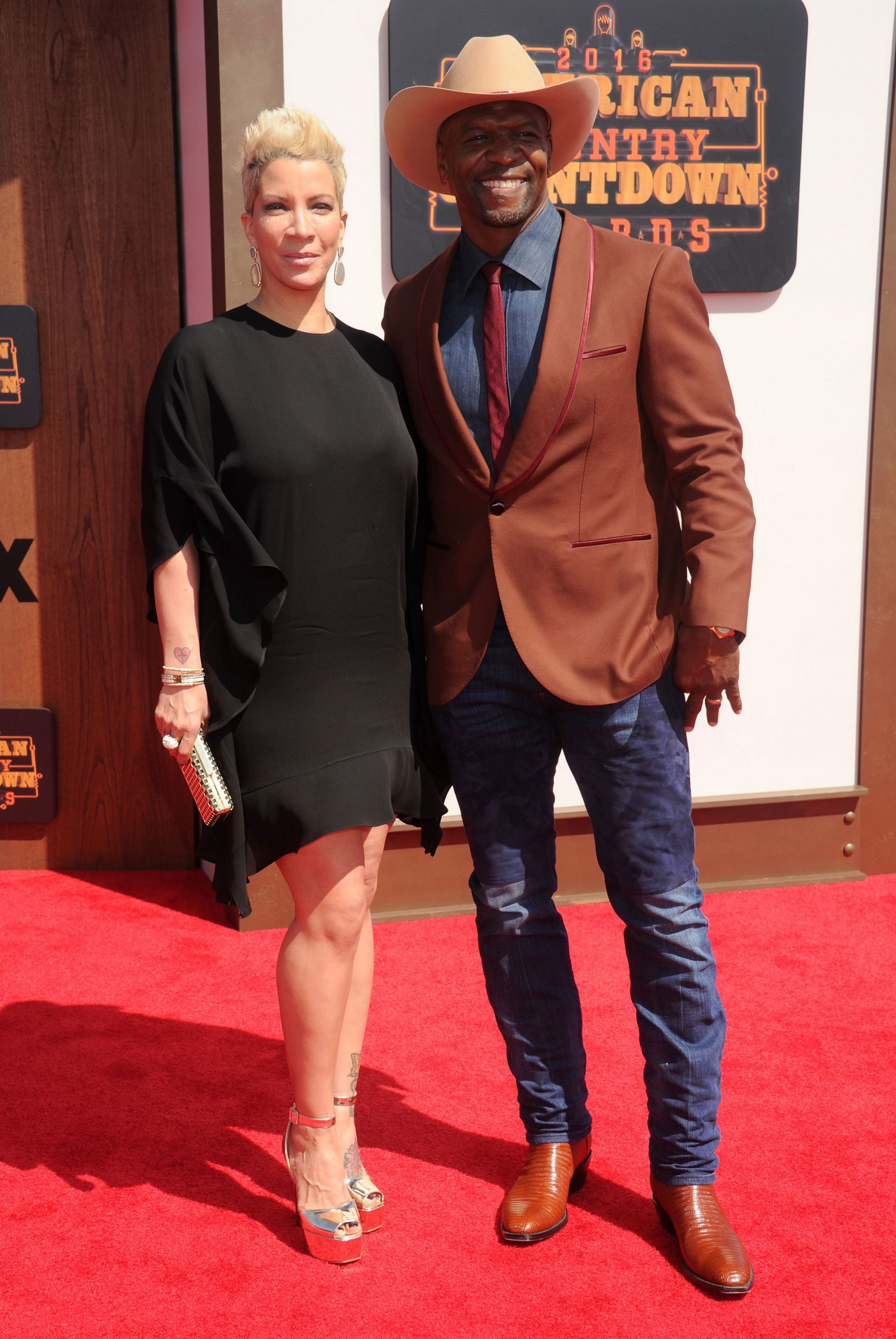 Terry Crews and his wife Rebecca at 2016 American Country Countdown Awards Source: Getty