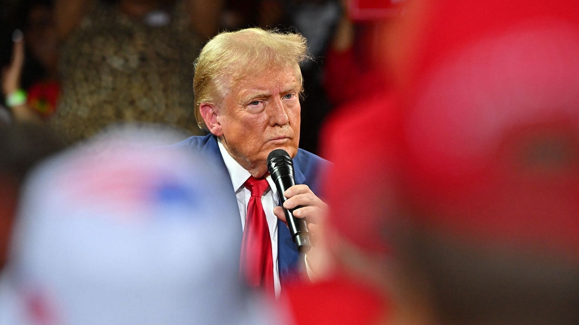 Republican presidential candidate Donald Trump participates in a town hall event moderated by Arkansas Governor Sarah Huckabee Sanders at the Dort Financial Center on September 17, 2024 in Flint, MI. (Photo by Ricky Carioti/The Washington Post via Getty Images)