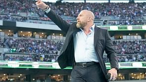 Triple H reacts after WWE officially replaces Michael Cole