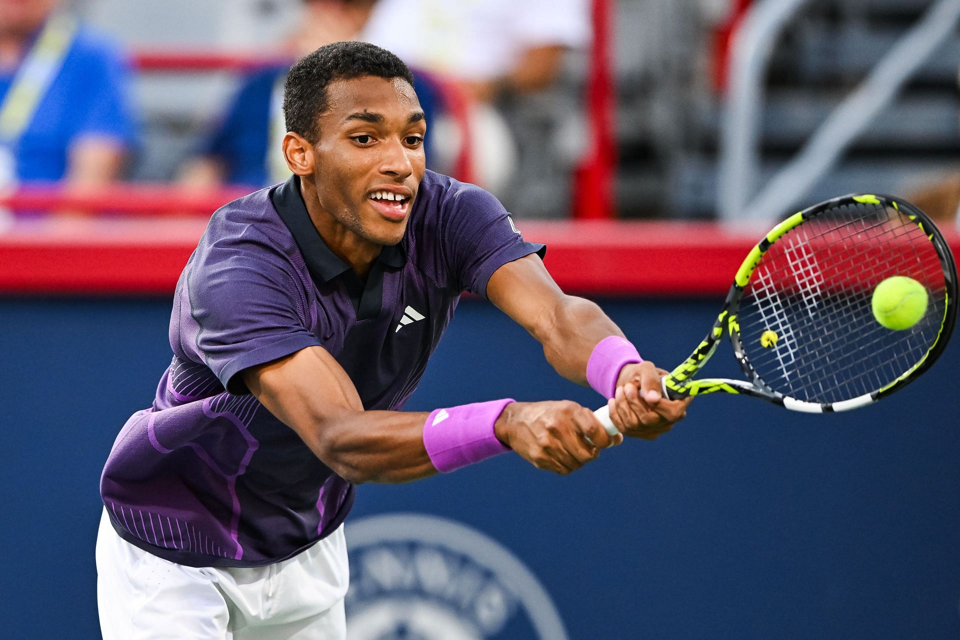 Felix Auger-Aliassime pictured returning a ball [Source: Getty]