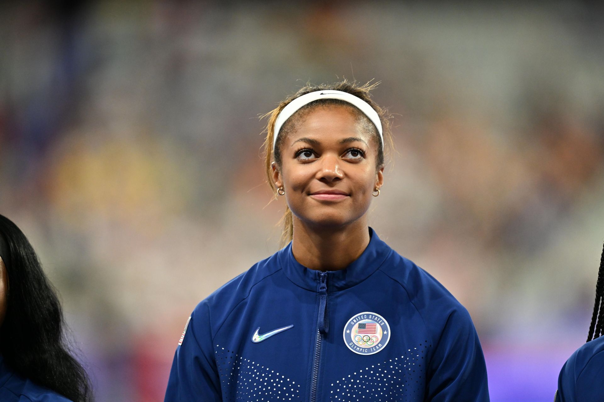 Gabby Thoams on the 4x100m relay gold podium at the Olympic Games Paris 2024 - Athletics - Source: Getty