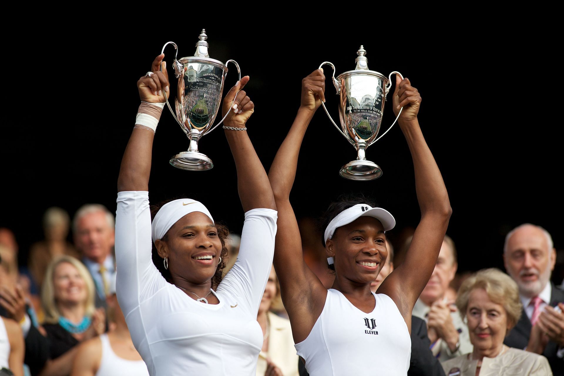 Serena Williams (L) &amp; Venus Williams (R) at Wimbledon [Image Source: Getty Images]