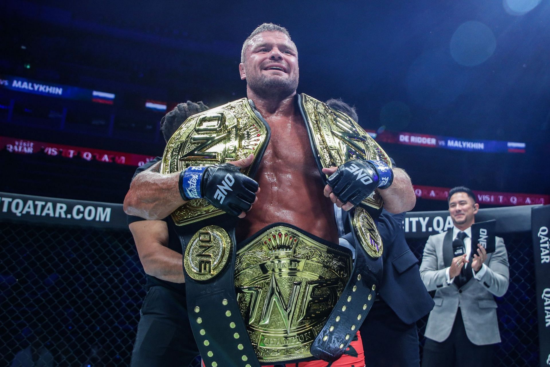 Anatoly Malykhin celebrates after his win over Reinier De Ridder at ONE 166 in Qatar.